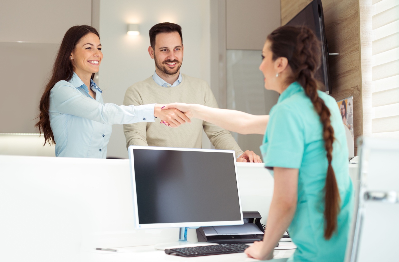 People thank a dental professional for explaining what to expect during sedation dentistry.